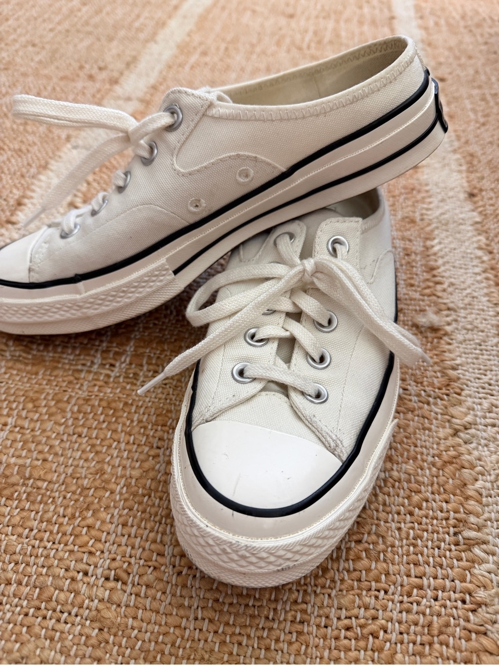 Converse Low Top Sneakers in Off-White with Black Trim slip one. Size 8